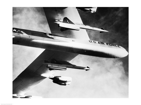 Framed Low angle view of a bomber plane carrying missiles during fight, AGM-28 Hound Dog, B-52 Stratofortress Print