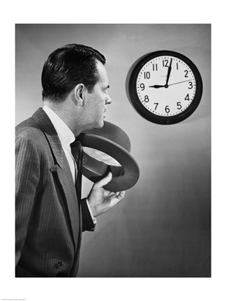 Framed Businessman looking at clock Print