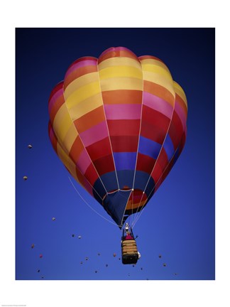 Framed Low angle view of a hot air balloon rising, Albuquerque International Balloon Fiesta, Albuquerque, New Mexico, USA Print