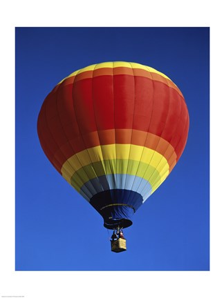 Framed Low angle view of a hot air balloon rising, Albuquerque International Balloon Fiesta, Albuquerque, New Mexico, USA Print