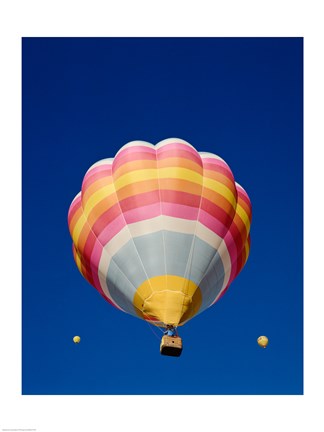 Framed Low Angle Shot of a Rainbow Hot Air Balloon Print