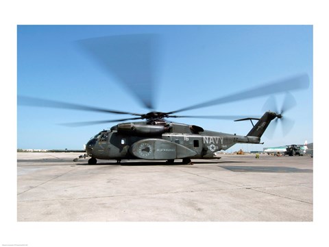 Framed MH-53E Sea Dragon Helicopter preparing to launch from a flight line Print