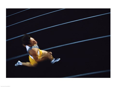 Framed High angle view of a young man running on a running track Print