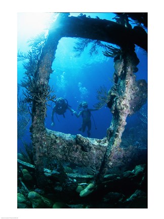 Framed Scuba diver investigating shipwrecks Print