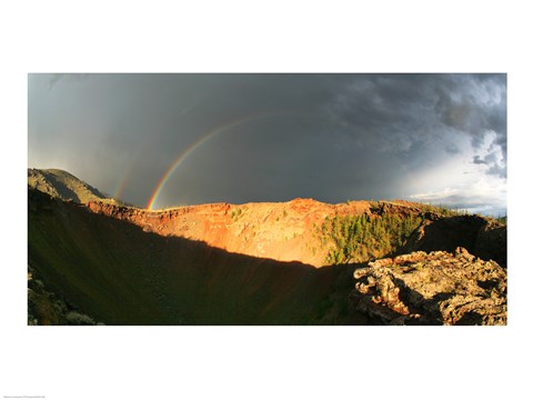 Framed Crater of an extinct volcano with a rainbow in the sky Print