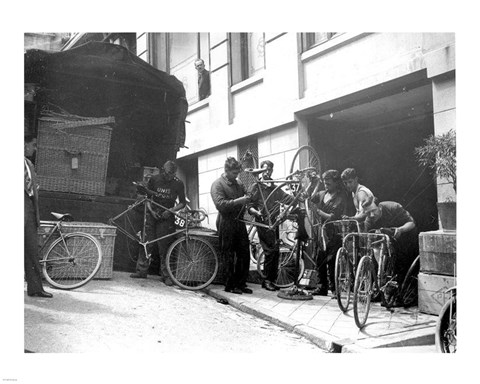 Framed Taking care of  maintenance of the racing bicycles during a rest day in Belfort Print
