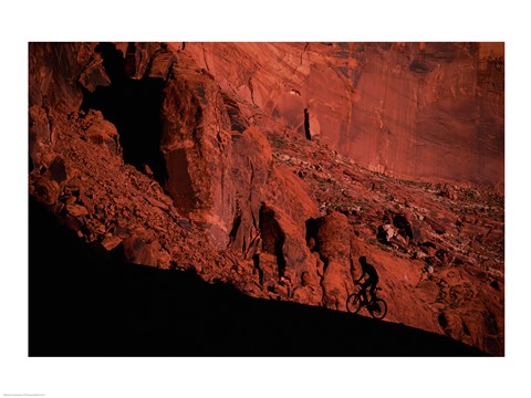 Framed Silhouette of a man mountain biking, Utah, USA Print