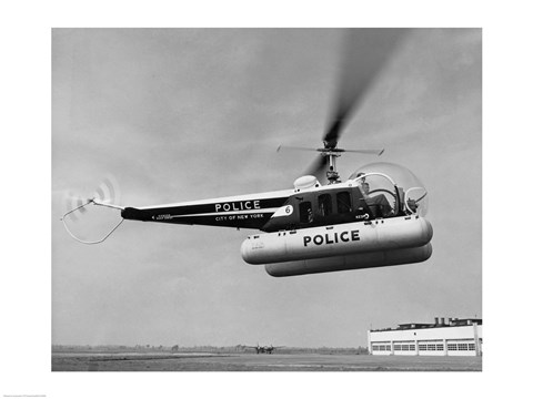 Framed Low angle view of a helicopter in flight, Bell 47-D, Bell Aircraft Corporation Print