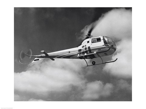 Framed Low angle view of a helicopter in flight in the sky, Bell Helicopter Print