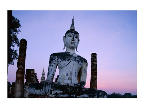 Framed Low angle view of the Seated Buddha, Wat Mahathat, Sukhothai, Thailand Print