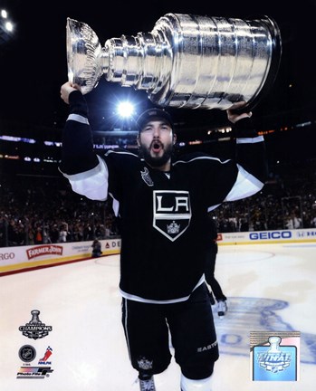 Framed Drew Doughty with the Stanley Cup Trophy after Winning Game 6 of the 2012 Stanley Cup Finals Print