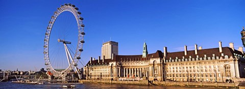 Framed Ferris wheel with buildings at the waterfront, River Thames, Millennium Wheel, London County Hall, London, England Print