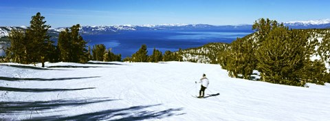 Framed Tourist skiing in a ski resort, Heavenly Mountain Resort, Lake Tahoe, California-Nevada Border, USA Print