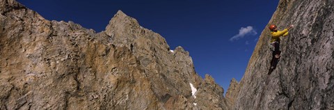 Framed Man climbing up a mountain, Grand Teton, Grand Teton National Park, Wyoming, USA Print