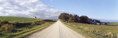 Framed Dirt road leading to a church, Iowa, USA Print