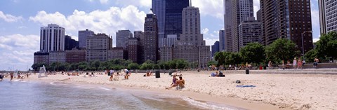 Framed Group of people on the beach, Oak Street Beach, Chicago, Illinois, USA Print