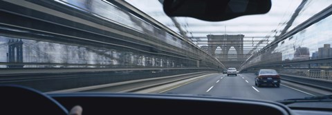 Framed Cars moving on the bridge, Brooklyn Bridge, New York City, New York State, USA Print