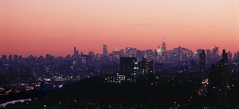 Framed High angle view of buildings lit up at dusk, Manhattan, New York City, New York State, USA Print