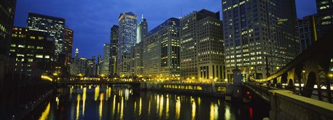 Framed Low angle view of buildings lit up at night, Chicago River, Chicago, Illinois, USA Print