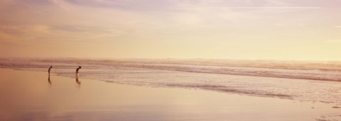 Framed Two children playing on the beach, San Francisco, California, USA Print
