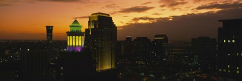 Framed High angle view of buildings lit up at dusk, New Orleans, Louisiana, USA Print