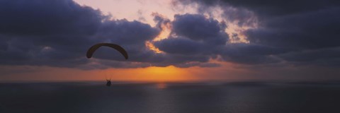 Framed Silhouette of a person paragliding over the sea, Blacks Beach, San Diego, California, USA Print