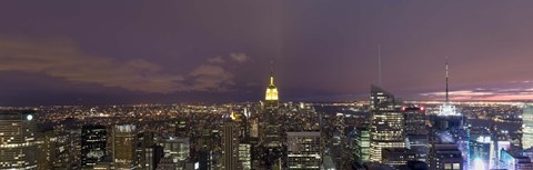 Framed Buildings in a city lit up at dusk, Midtown Manhattan, Manhattan, New York City, New York State, USA Print