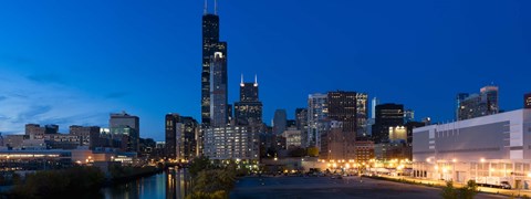 Framed Buildings in a city lit up at dusk, Chicago, Illinois, USA Print