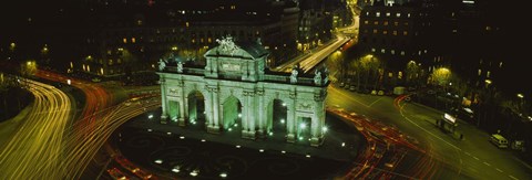 Framed High angle view of a monument lit up at night, Puerta De Alcala, Plaza De La Independencia, Madrid, Spain Print