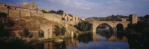 Framed Castle at the waterfront, Puente de San Martin, Tajo River, Toledo, Spain Print
