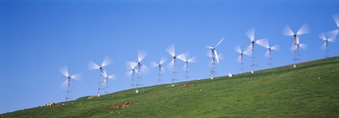 Framed Low angle view of wind turbines on a hill, Altamont Pass, California, USA Print