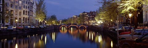 Framed Night View Along Canal Amsterdam The Netherlands Print