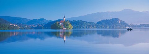 Framed Reflection of mountains and buildings in water, Lake Bled, Slovenia Print