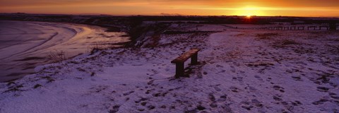 Framed Bench On A Snow Covered Landscape, Filey Bay, Yorkshire, England, United Kingdom Print