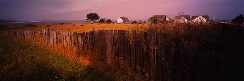 Framed Wooden fence in a field with houses in the background, Mendocino, California, USA Print