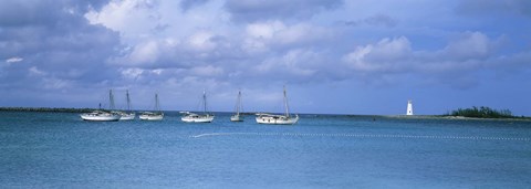 Framed Boats in the sea with a lighthouse in the background, Nassau Harbour Lighthouse, Nassau, Bahamas Print