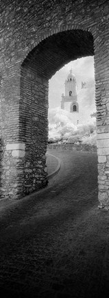 Framed Church viewed through an archway, Puerta Del Sol, Medina Sidonia, Cadiz, Andalusia, Spain Print