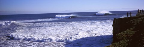 Framed Tourist looking at waves in the sea, Santa Cruz, Santa Cruz County, California, USA Print