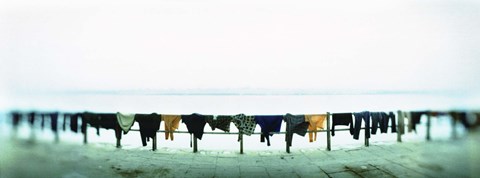 Framed Clothes drying at the riverbank, Ganges River, Varanasi, Uttar Pradesh, India Print
