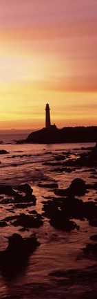 Framed Silhouette of a lighthouse at sunset, Pigeon Point Lighthouse, San Mateo County, California Print