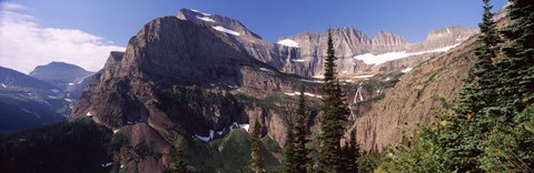 Framed Trees with a mountain range in the background, US Glacier National Park, Montana, USA Print