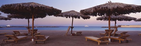 Framed Lounge chairs with sunshades on the beach, Hilton Resort, Hurghada, Egypt Print