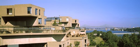 Framed Housing complex with a bridge in the background, Habitat 67, Jacques Cartier Bridge, Montreal, Quebec, Canada Print