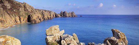 Framed Rock formations at seaside, Logan rock, Porthcurno Bay, Cornwall, England Print