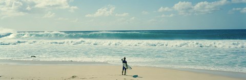 Framed Surfer standing on the beach, North Shore, Oahu, Hawaii Print