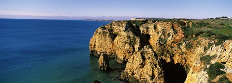 Framed Rock formations in the ocean, Lagos, Algarve, Portugal Print