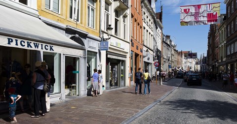 Framed Stores in a street, Bruges, West Flanders, Belgium Print