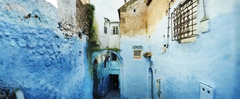 Framed Narrow streets of the medina are all painted blue, Chefchaouen, Morocco Print