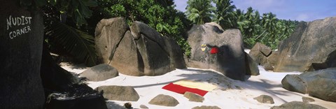 Framed Nudist corner written on a rock on the beach, Mahe Island, Seychelles Print