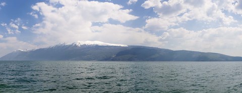 Framed Lake with mountain range in the background, Monte Baldo, Lake Garda, Lombardy, Italy Print